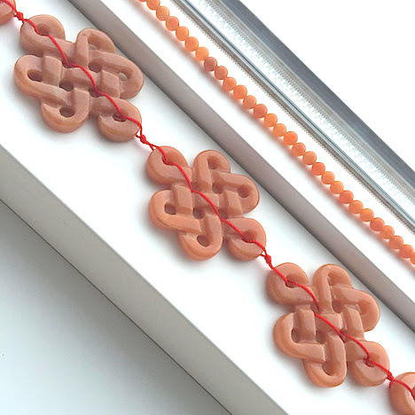 Bead, red aventurine, 35x47mm carved knots(8), 4mm round (16") - Click Image to Close