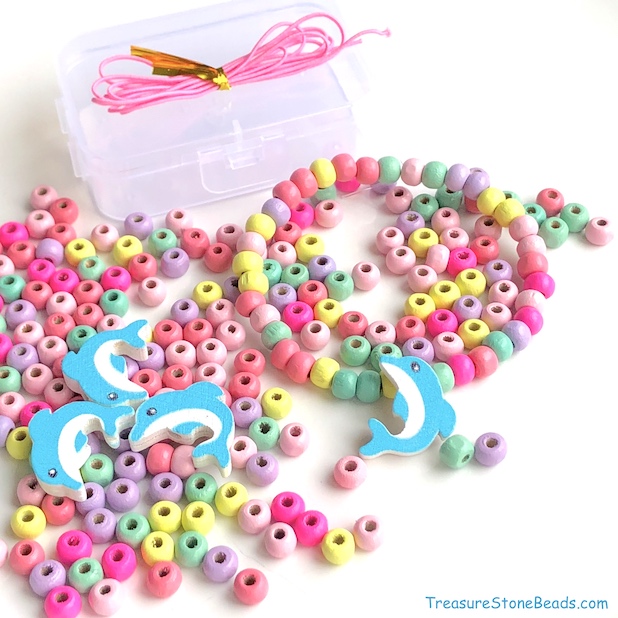 Beading kit, 4 dolphin charms, 130 6mm wood beads. each