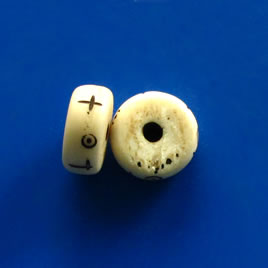 Bead, bone, white and brown, 12x5mm carved heishi. Pkg of 7