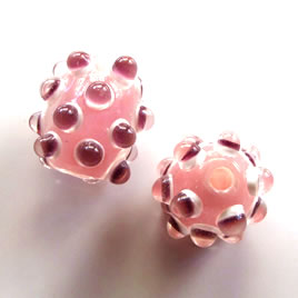 Bead, lampworked glass, pink, 22mm bumpy. Sold individually.