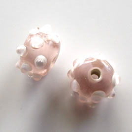 Bead, lampworked glass, clear, 9x14mm bumpy rondelle. Pkg of 6.