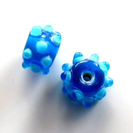 Bead, lampworked glass, blue, 10x14mm bumpy rondelle. Pkg of 6
