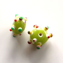 Bead, lampworked glass, green, 9x17mm bumpy rondelle. Pkg of 4 - Click Image to Close