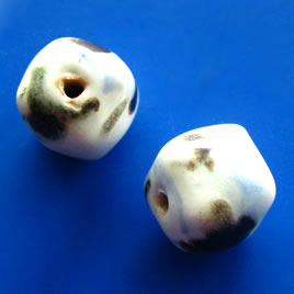 Bead, porcelain, 13x15mm white, black, blue nugget. Pkg of 4.
