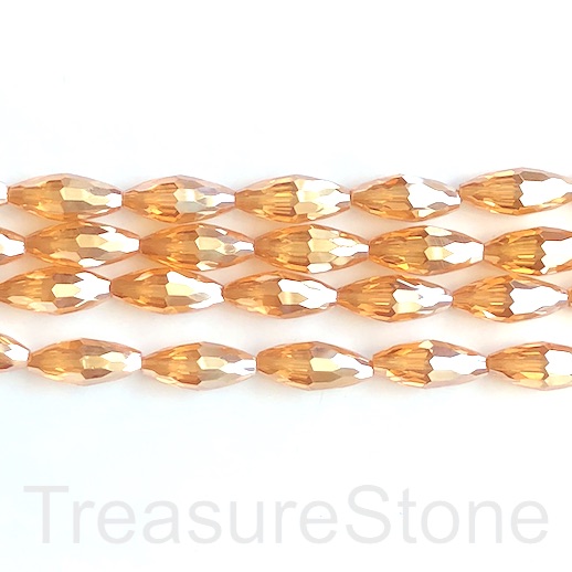 Bead, crystal, champagne, 10x23mm faceted rice. 15-inch, 17pcs