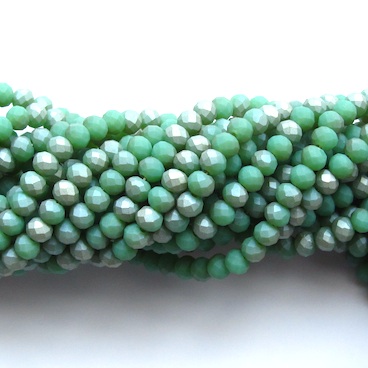 Bead, crystal, green, matte with silver, 3x4mm rondelle, 19-inch