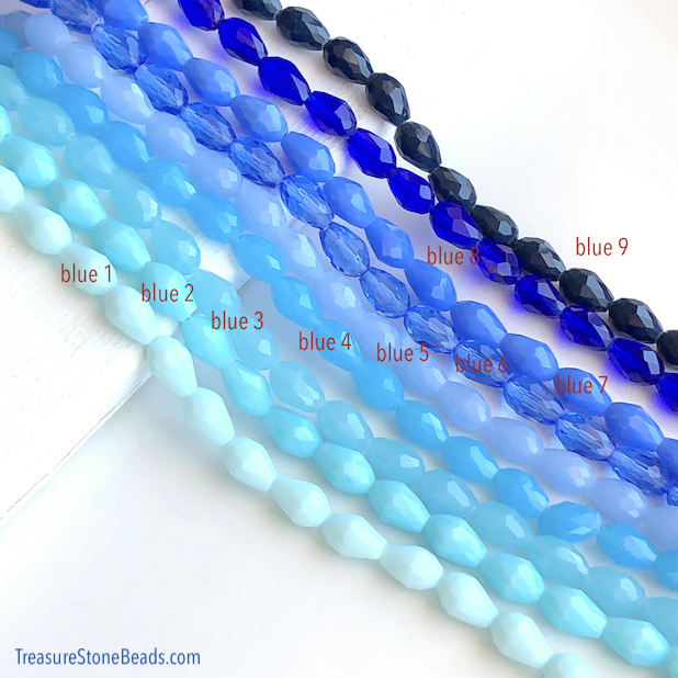 Bead, crystal, blue 5 8x12mm faceted teardrop. 13",28