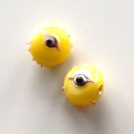 Bead, lampworked glass, yellow, 10x12x6mm evil eye. Pkg of 8.