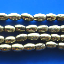 Bead, pyrite, 4x6mm oval. 16 inch strand.