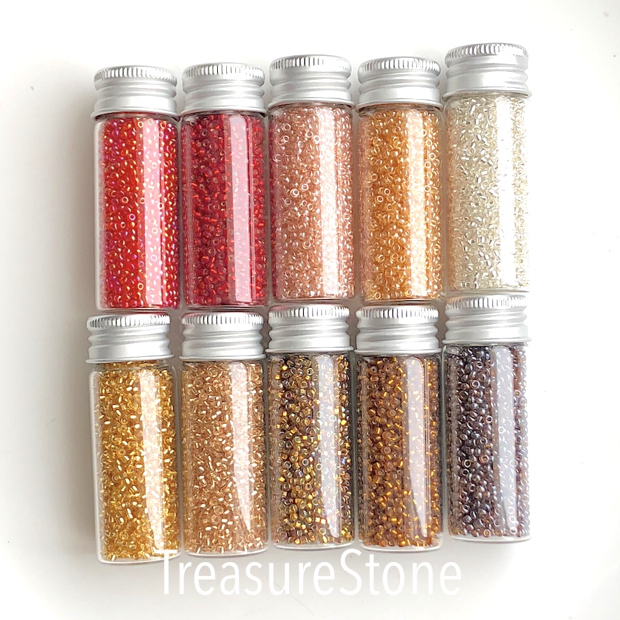 Seed bead, glass, gold, silver lined, 11/0, 2.2mm round. 15g