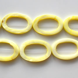 Bead, shell, yellow (dyed), 20x30mm oval frame. 16-inch strand.