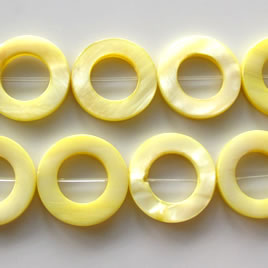 Bead, shell, yellow (dyed), 20mm round donut. 16-inch strand.