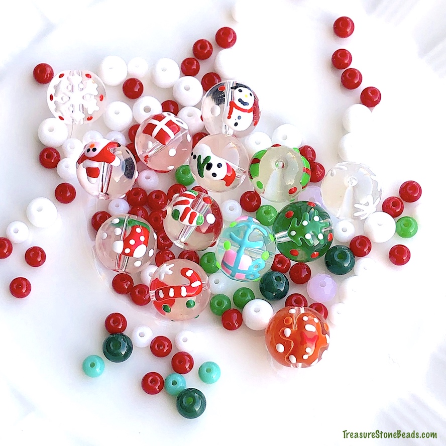 Bead, lampwork glass, gingerbread man, 12mm clear round. 4pcs