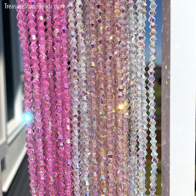 Bead, crystal glass, peach pink, 2AB, 4mm bicone,19.5", 140pcs